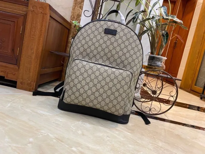 55430761df3cbb31 Replica GUCCI MEDIUM GG BACKPACK WITH TAG